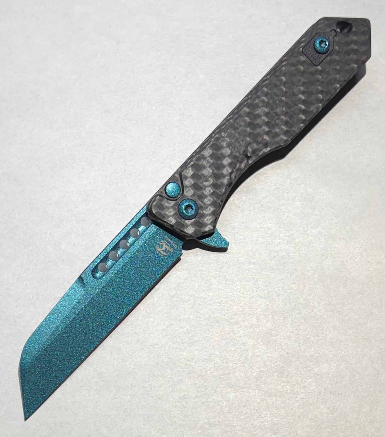 Heretic Jinn-Manual-Metallic Teal-Carbon Fiber